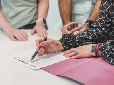 signing a paper