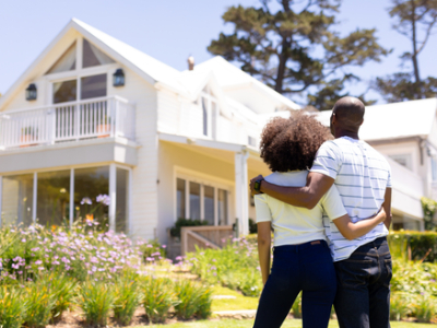 couple looking at their home